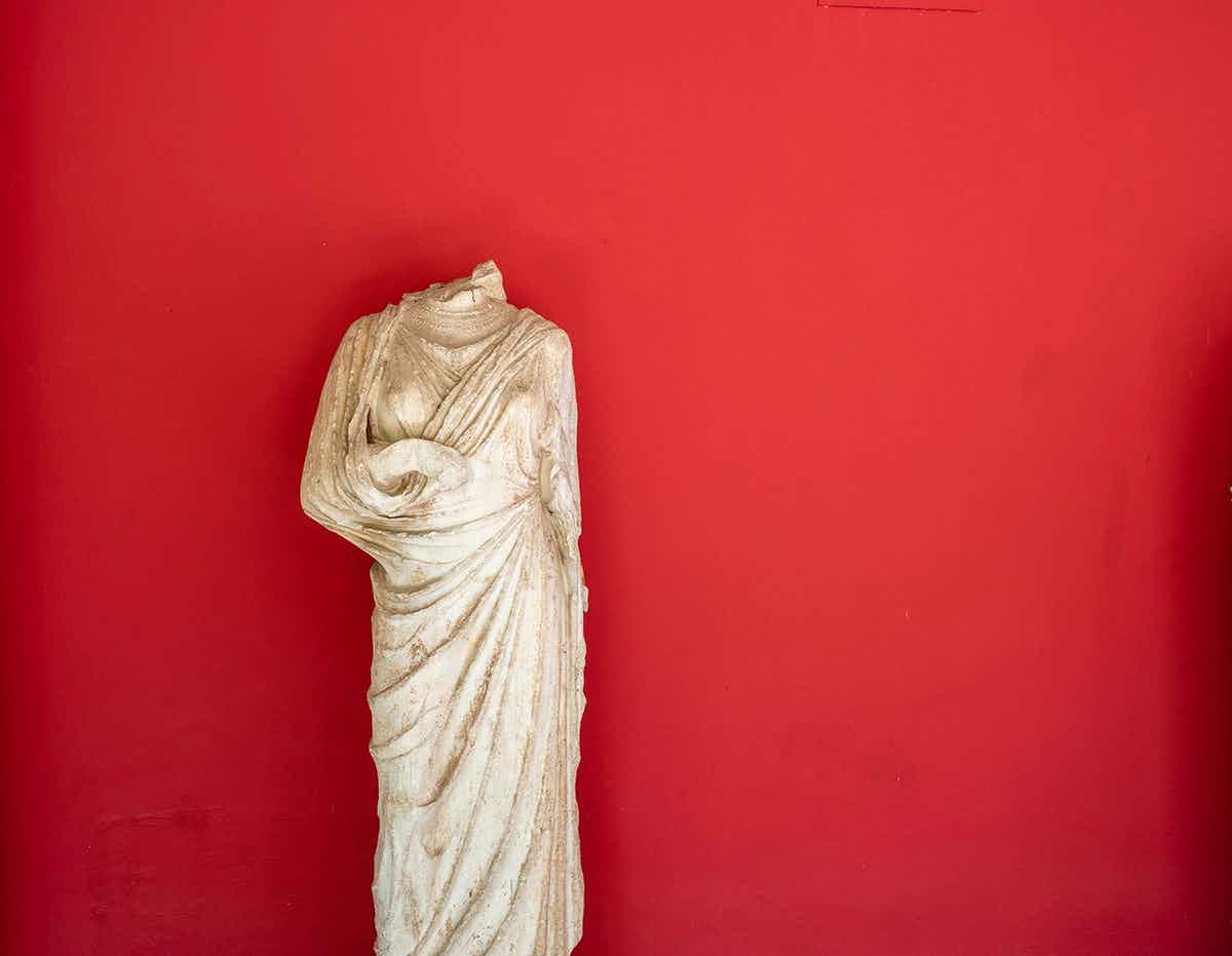 A headless statute of a women from The National Archaeological Museum of Athens, Greece